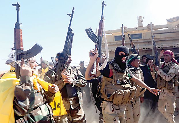 昨日ティクリートに進撃した「人民動員隊」(AFP)